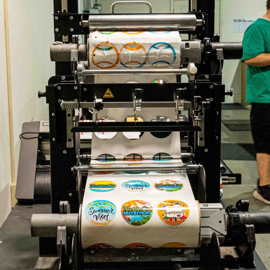 Round labels being printed on roll.